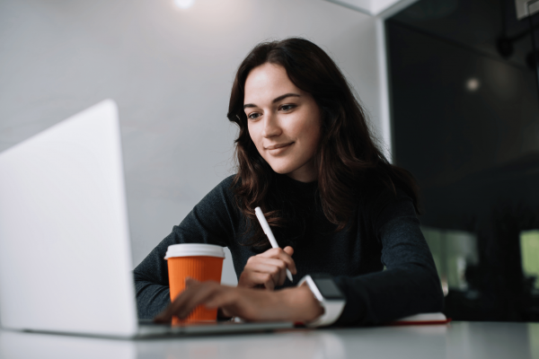 Business woman working on her laptop